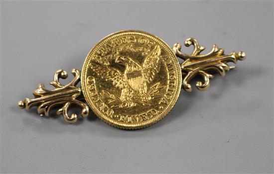 A United States 1893 5 dollar gold coin, now mounted as a brooch with 15ct mount, 49mm. Gross 10.5 grams